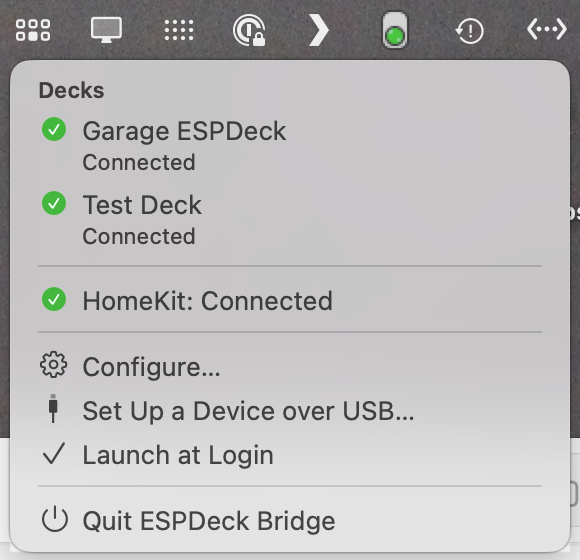 The menu bar menu, listing two decks as connected, HomeKit as connected, and the Configure, Set Up a Device over USB, Launch at Login and Quit commands.